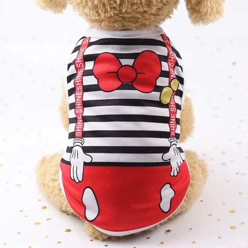 Black and white striped mesh dog vest with red trim, a red bow, and SHINE printed on the straps.