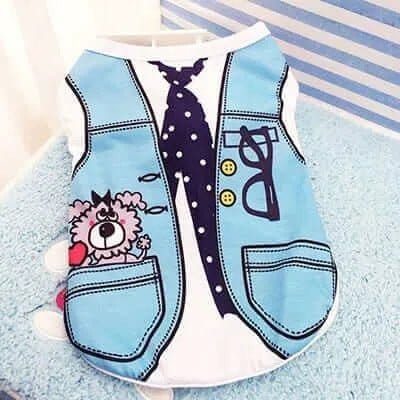 Light blue and white fabric dog vest printed with a tuxedo, polka dot tie, glasses, and a pink cartoon dog.