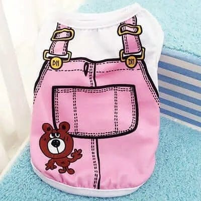White fabric dog vest with a pink overall print, a cartoon bear, and DH printed on gold buttons.