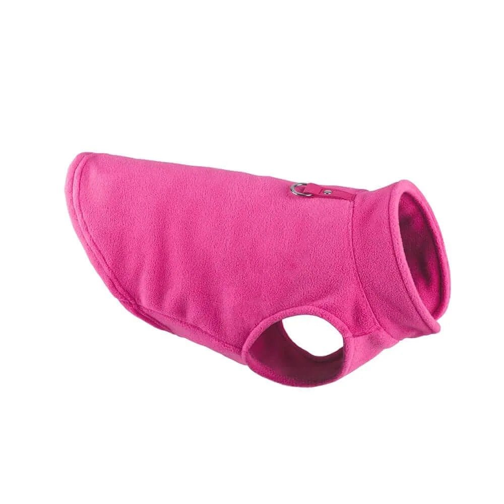 Pink fabric dog jacket with a high collar, leg holes, and a small metal ring on the back