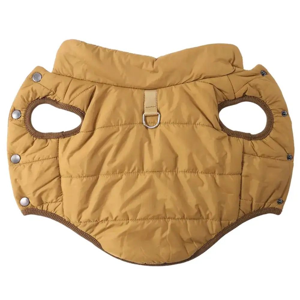 Tan quilted fabric dog coat with a metal D-ring, brown trim, and silver snap buttons laid flat on a white background.