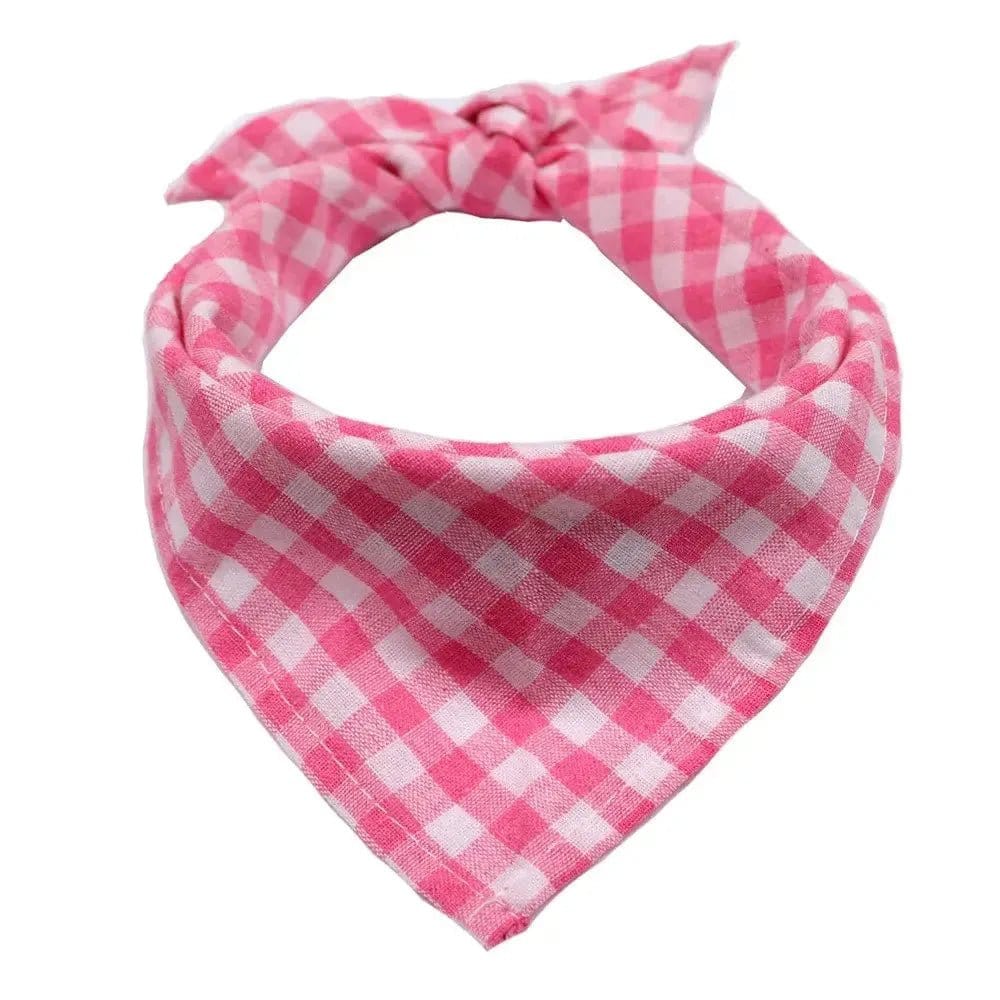 One pink and white checkered fabric dog bandana tied in a knot.