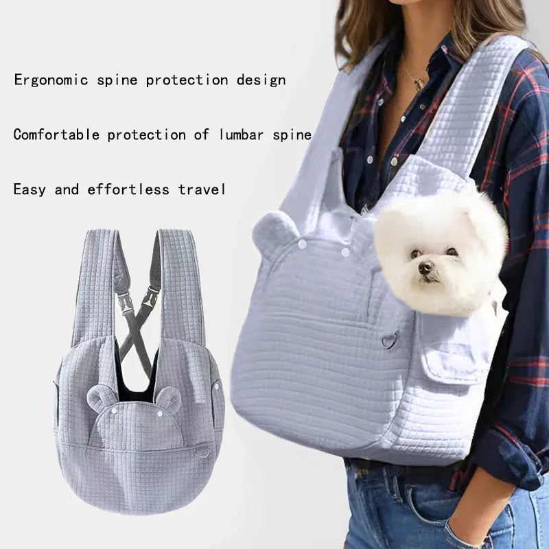 Pet carrier with ergonomic design for travel, featuring a small white dog inside.