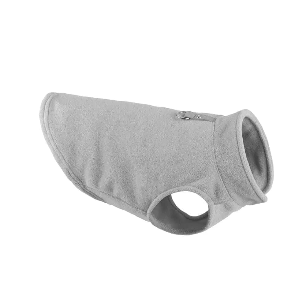 Grey fleece dog jacket with a high collar, leg holes, and a metal D-ring on the back.