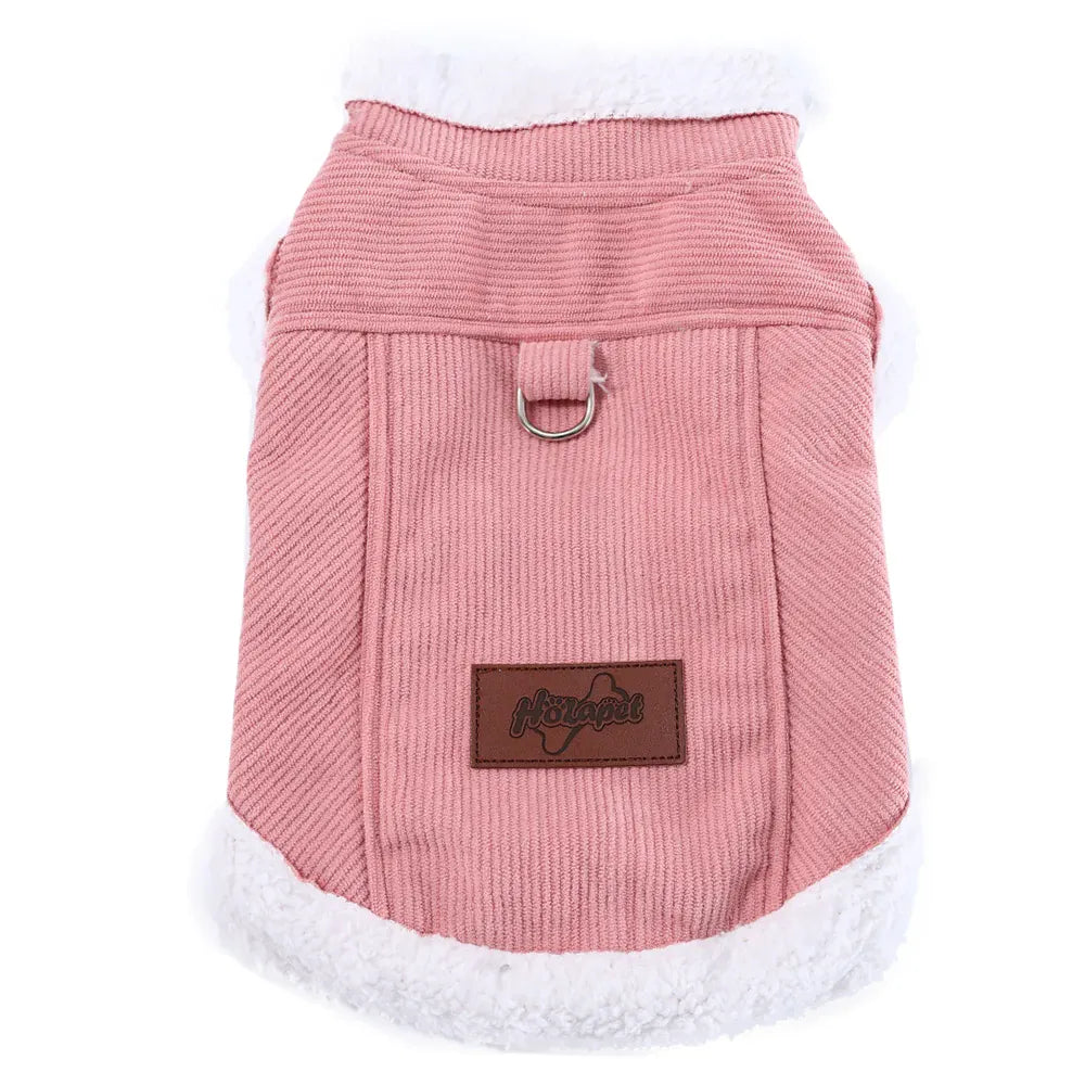 Pink corduroy dog vest with white fleece trim, metal D-ring, and a brown Hoiapet brand patch.