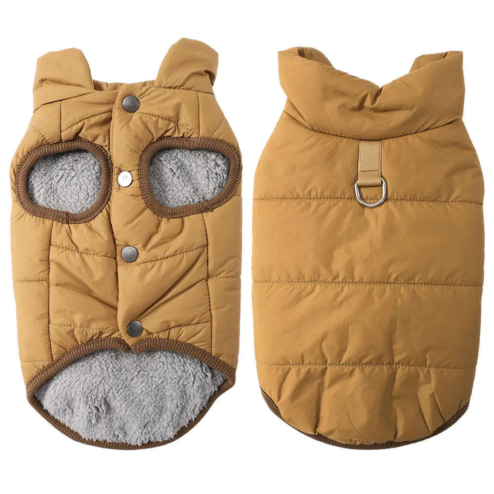 Front and back views of a tan quilted dog coat with grey fleece lining, snap buttons, and a metal D-ring leash attachment.