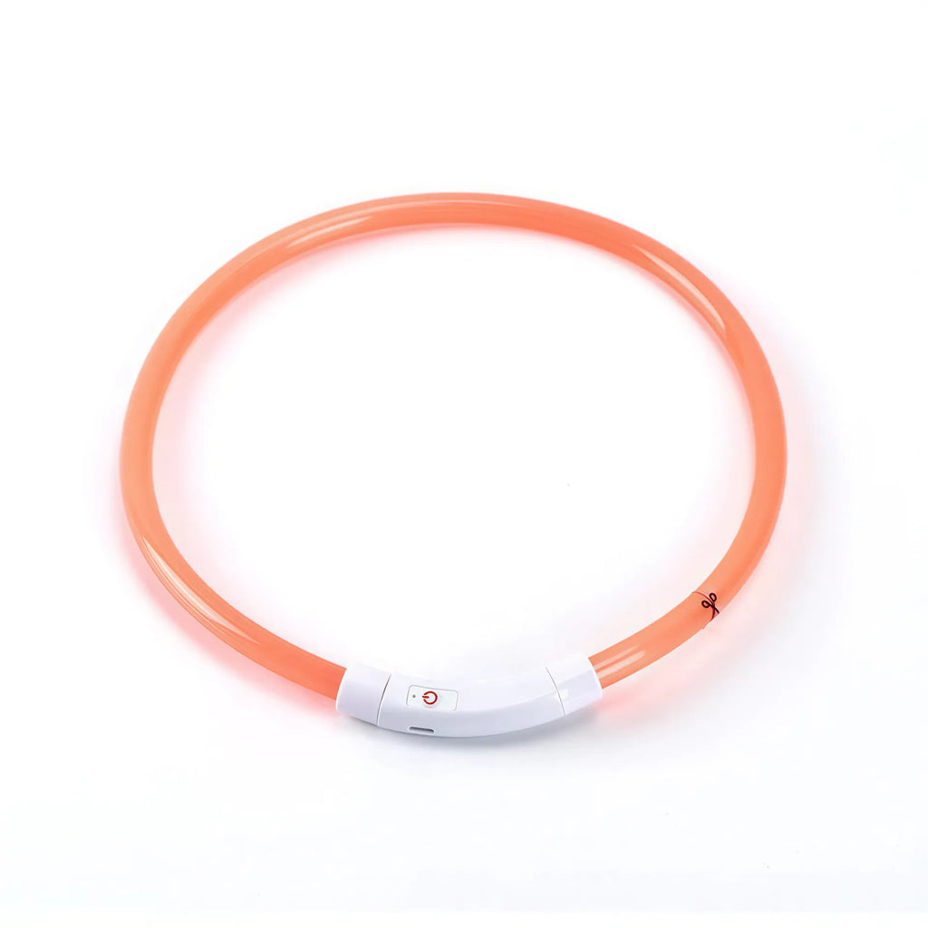 One orange plastic LED dog collar with a white rechargeable power clasp and a scissor icon on the tubing.
