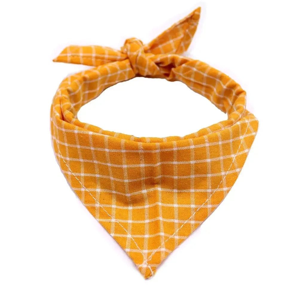 One orange and white checkered fabric dog bandana tied in a circle on a white background.